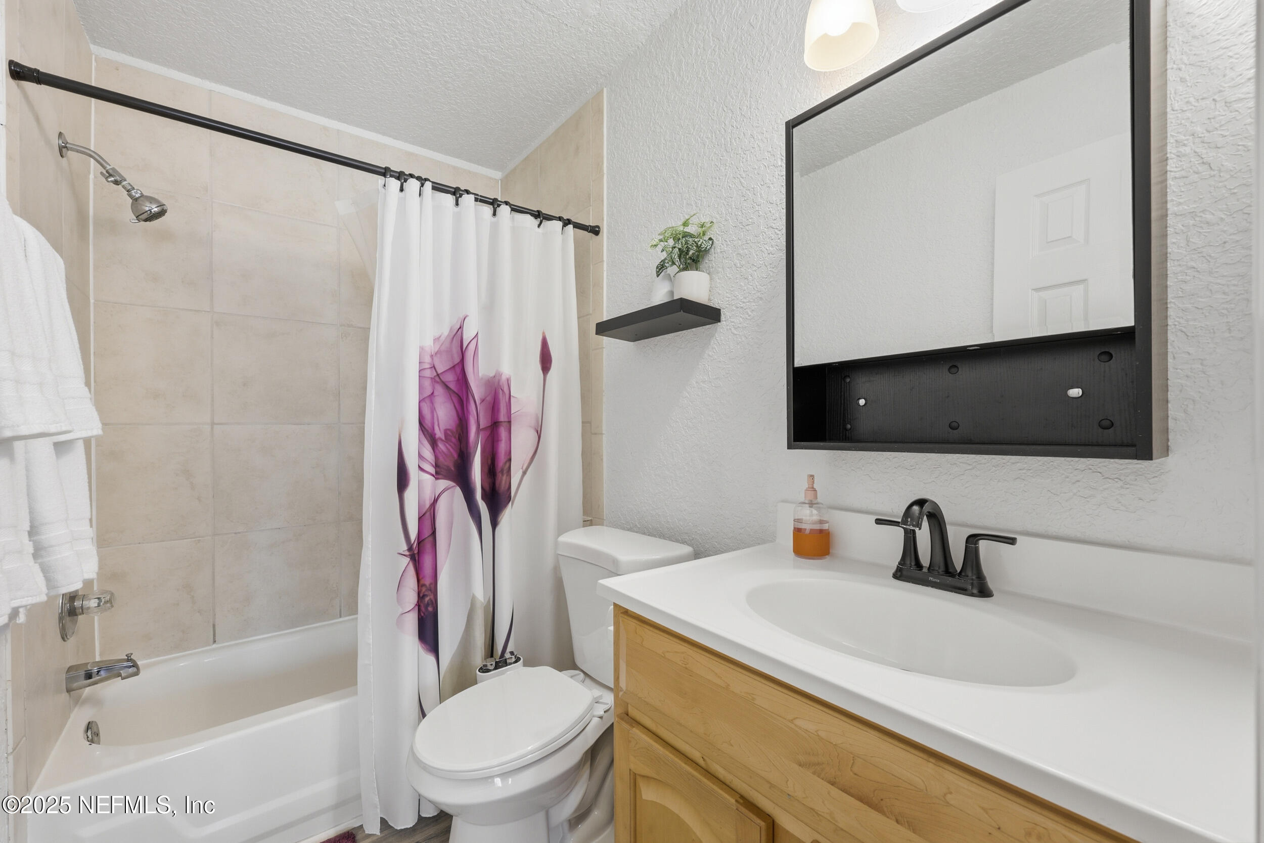 47 Clipper Court St. Augustine, FL 32080 - Photo 23 of 50 a bathroom with a sink toilet and shower