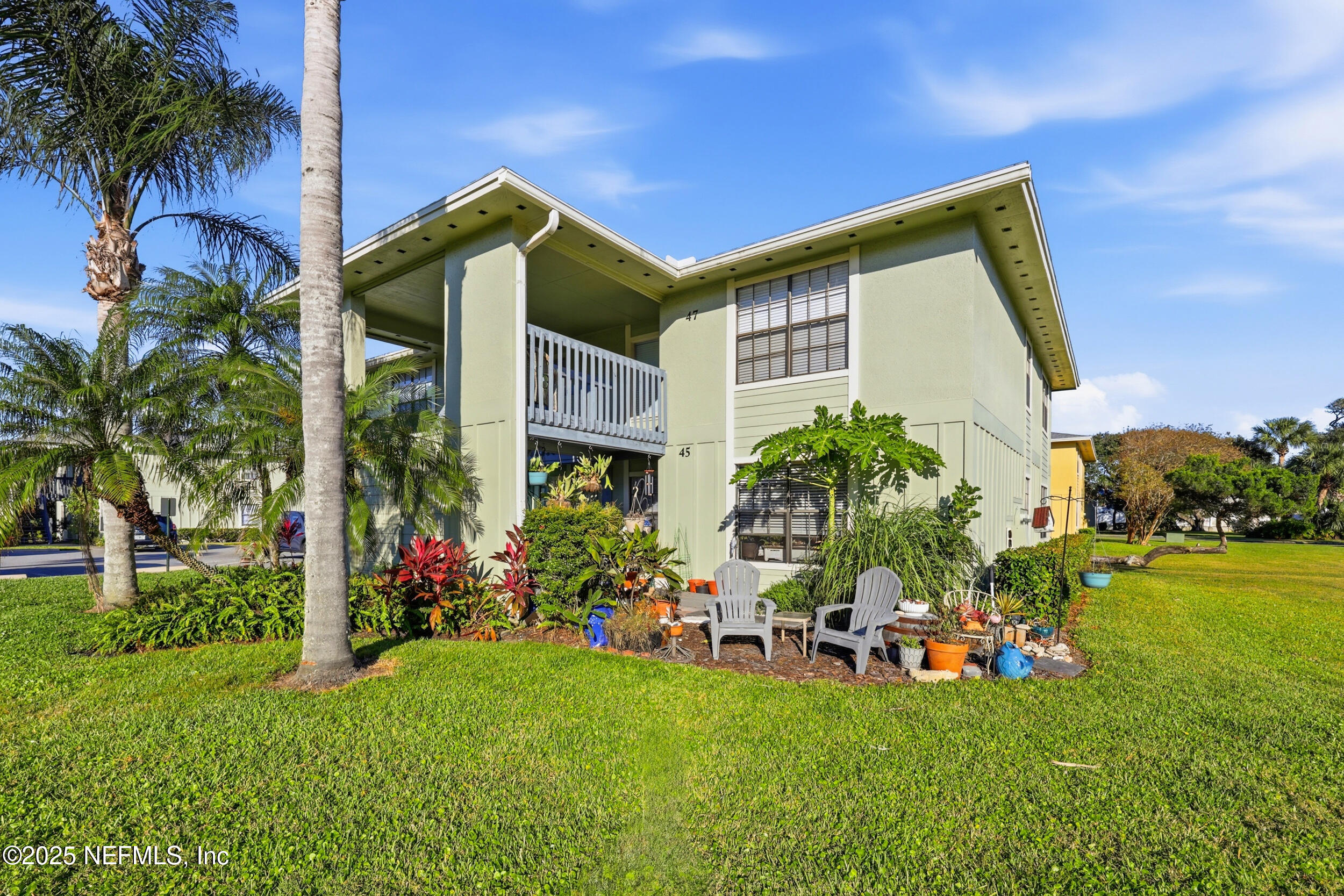 47 Clipper Court St. Augustine, FL 32080 - Photo 29 of 50 a view of a house with a yard and sitting area