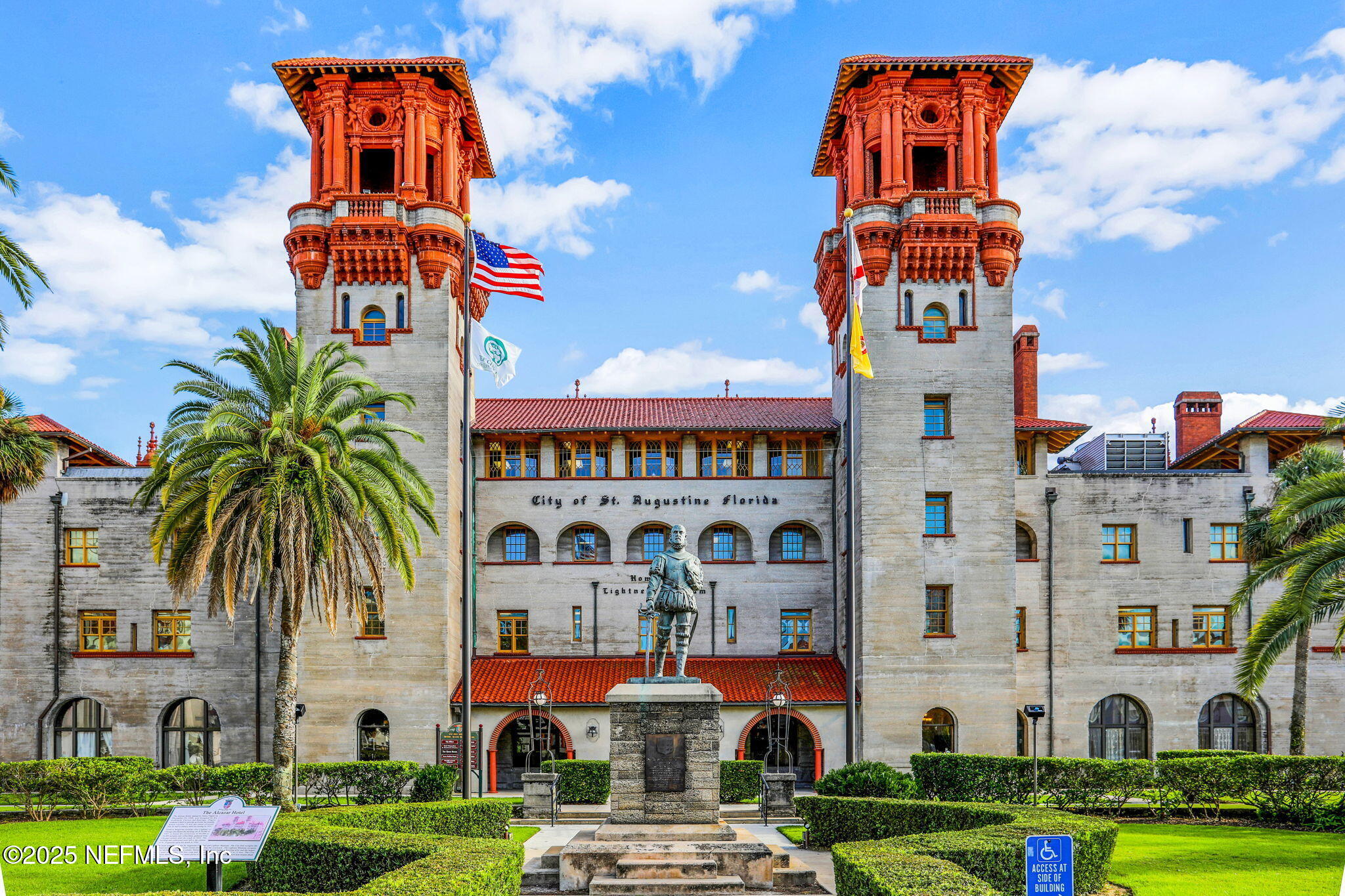 47 Clipper Court St. Augustine, FL 32080 - Photo 42 of 50 a front view of multi story residential apartment building with yard and green space