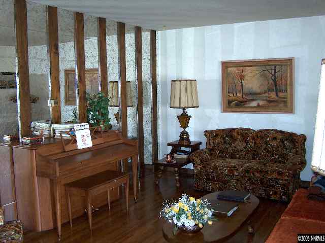 978 Lester Avenue Reno, NV 89502 - Photo 2 of 7 a living room with furniture and a large window