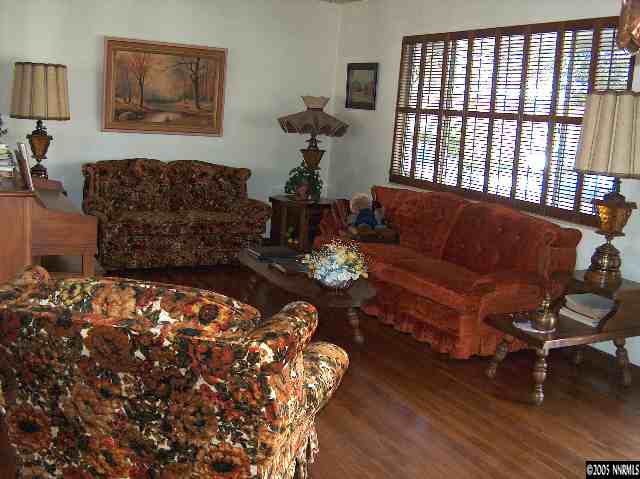 978 Lester Avenue Reno, NV 89502 - Photo 3 of 7 a living room with furniture a couch and a potted plant
