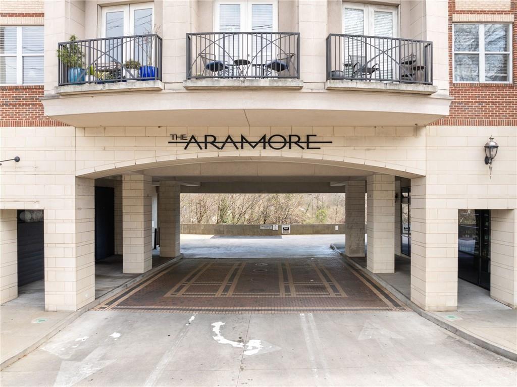 2255 Peachtree Road Northeast, Unit 326 Atlanta, GA 30309 - Photo 34 of 37 a view of a building with a window and fire pit