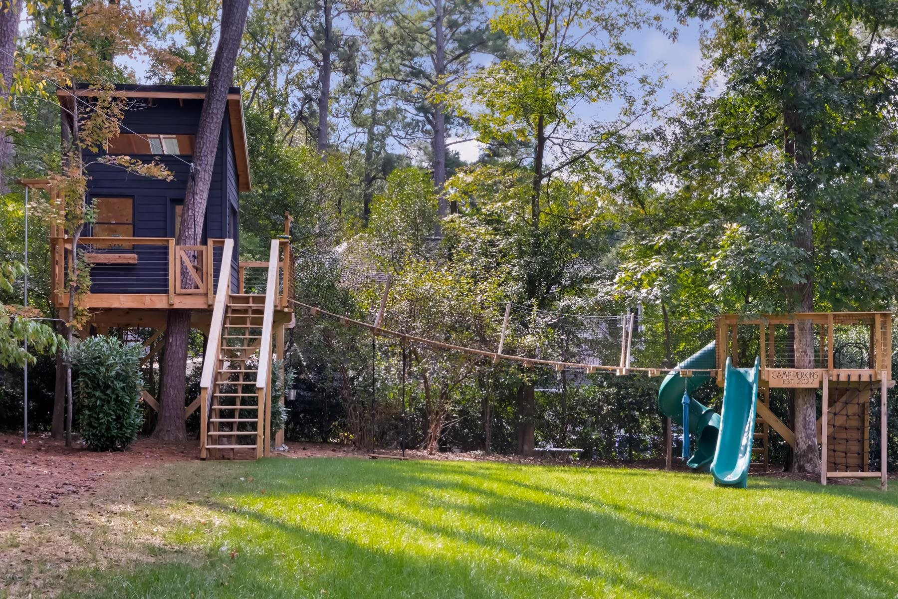 4003 Bristol Road Durham, NC 27707 - Photo 93 of 100 a view of a house with a backyard and a patio