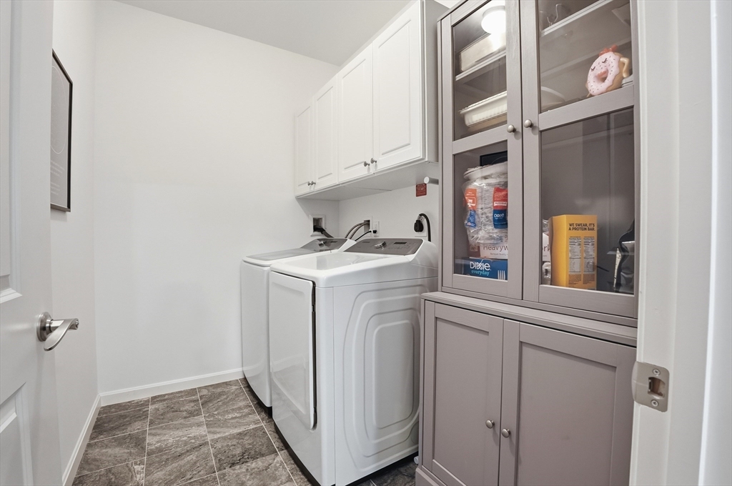15 Revolution Way, Unit 2205 Canton, MA 02021 - Photo 17 of 34 a utility room with dryer and washer