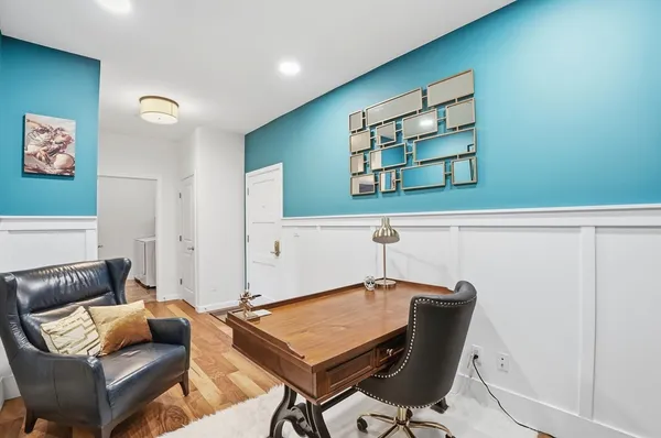 a living room with furniture and window
