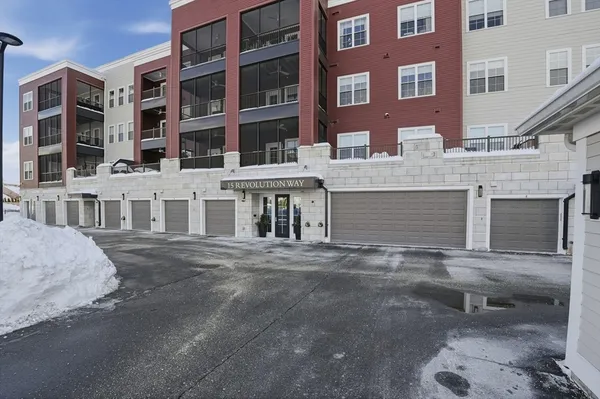 a front view of a building with a street