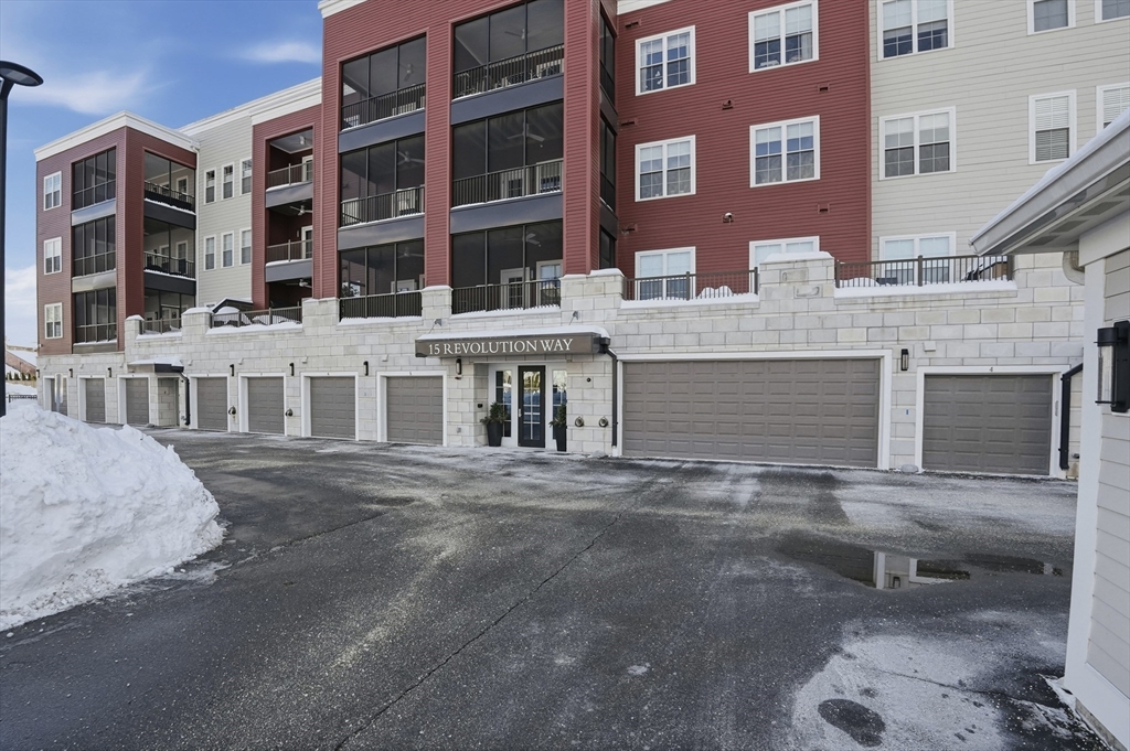 15 Revolution Way, Unit 2205 Canton, MA 02021 - Photo 2 of 34 a front view of a building with a street