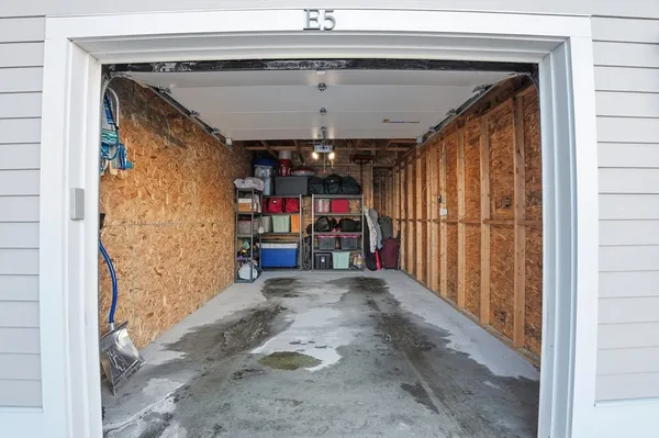 a view of a roof deck with lounge chairs