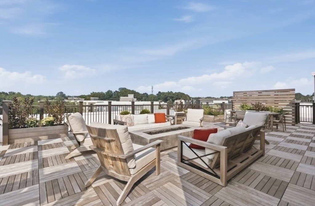 15 Revolution Way, Unit 2205 Canton, MA 02021 - Photo 24 of 34 an outdoor patio with patio