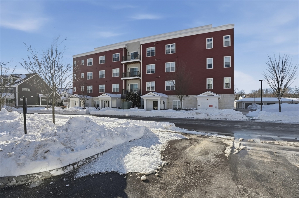 15 Revolution Way, Unit 2205 Canton, MA 02021 - Photo 33 of 34 a front view of a building with street