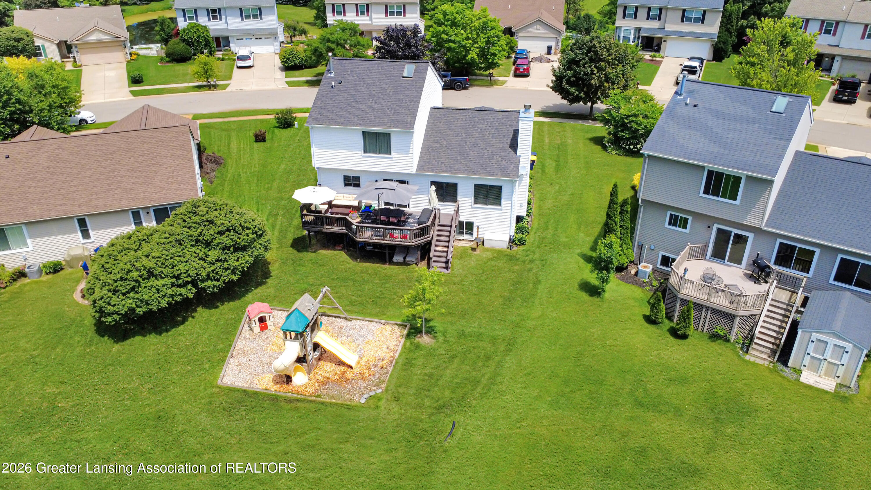 1725 Chelsea Circle Howell, MI 48843 - Photo 4 of 43 Aerial Backyard