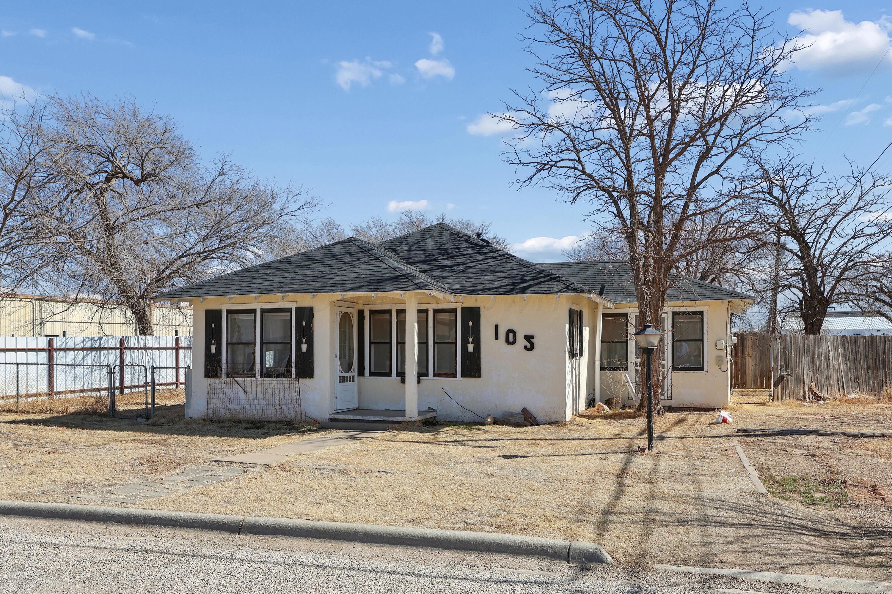 105 16th Street Canyon, TX 79015 - Photo 1 of 1 a front view of a house with a garden