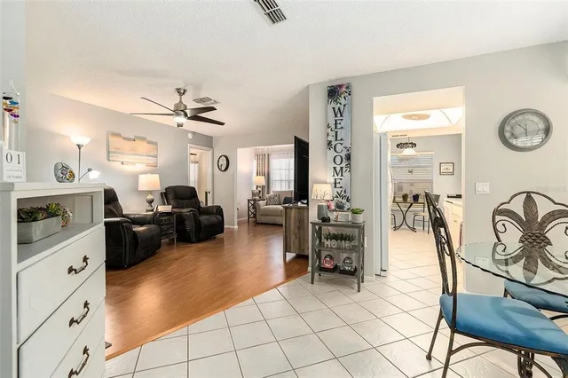 a view of a livingroom with furniture and a window