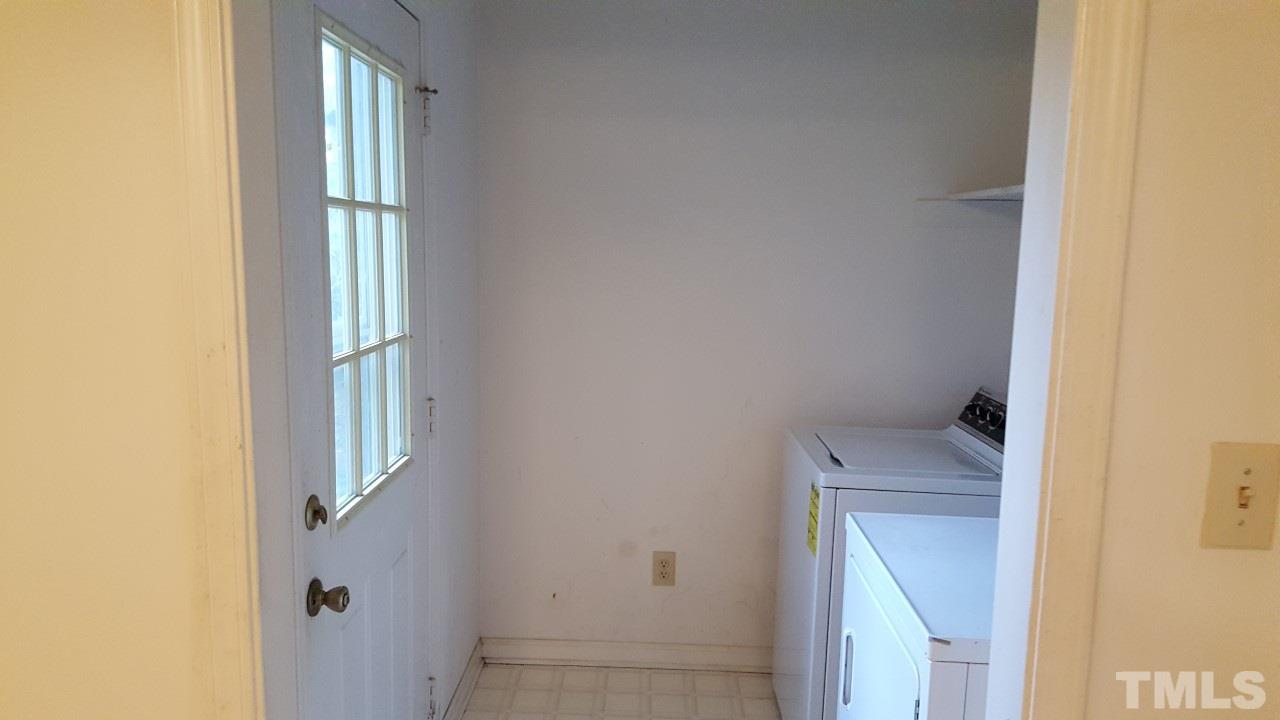 Separate laundry room.