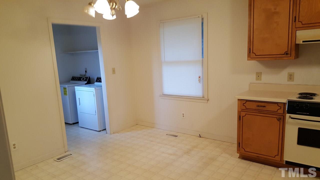 Breakfast area looking into the laundry room.