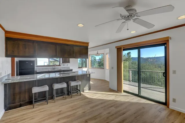 a view of a kitchen and dining room