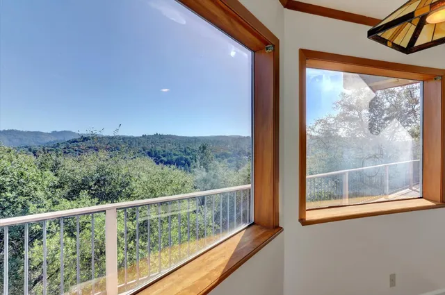 a view of a balcony with an outdoor space