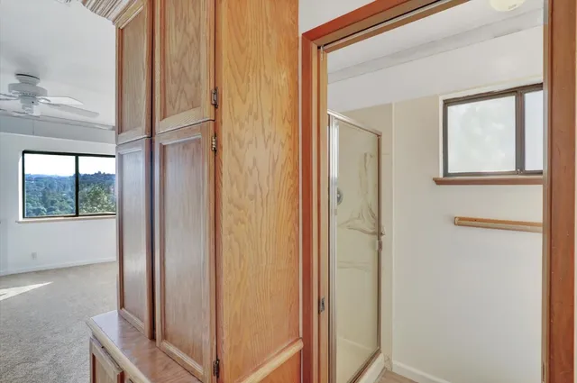 a view of a bathroom with a glass door