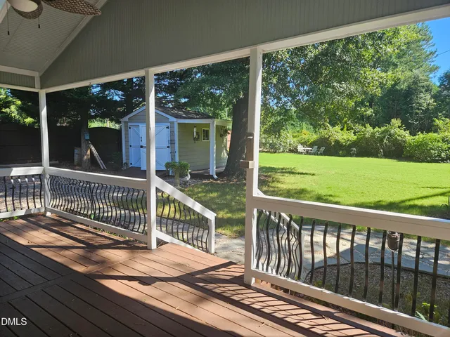 a view of a two chairs in the deck