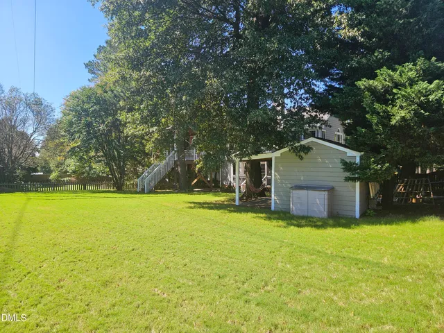 a house with swimming pool in front of it