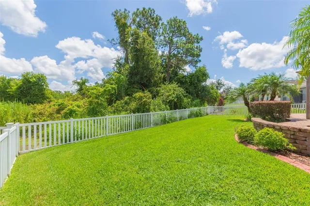 a view of a backyard with garden