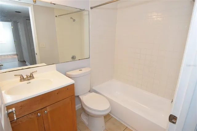 a view of a utility room with wooden floor
