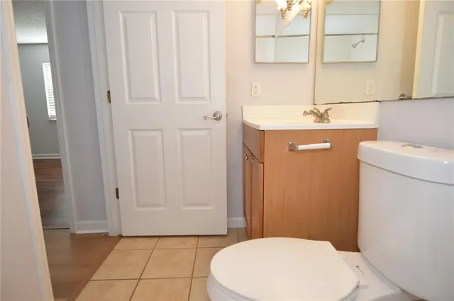 a view of balcony with wooden floor