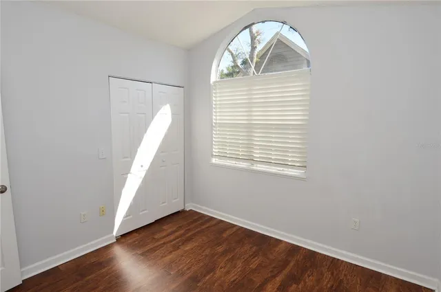 a view of a swimming pool with outdoor seating
