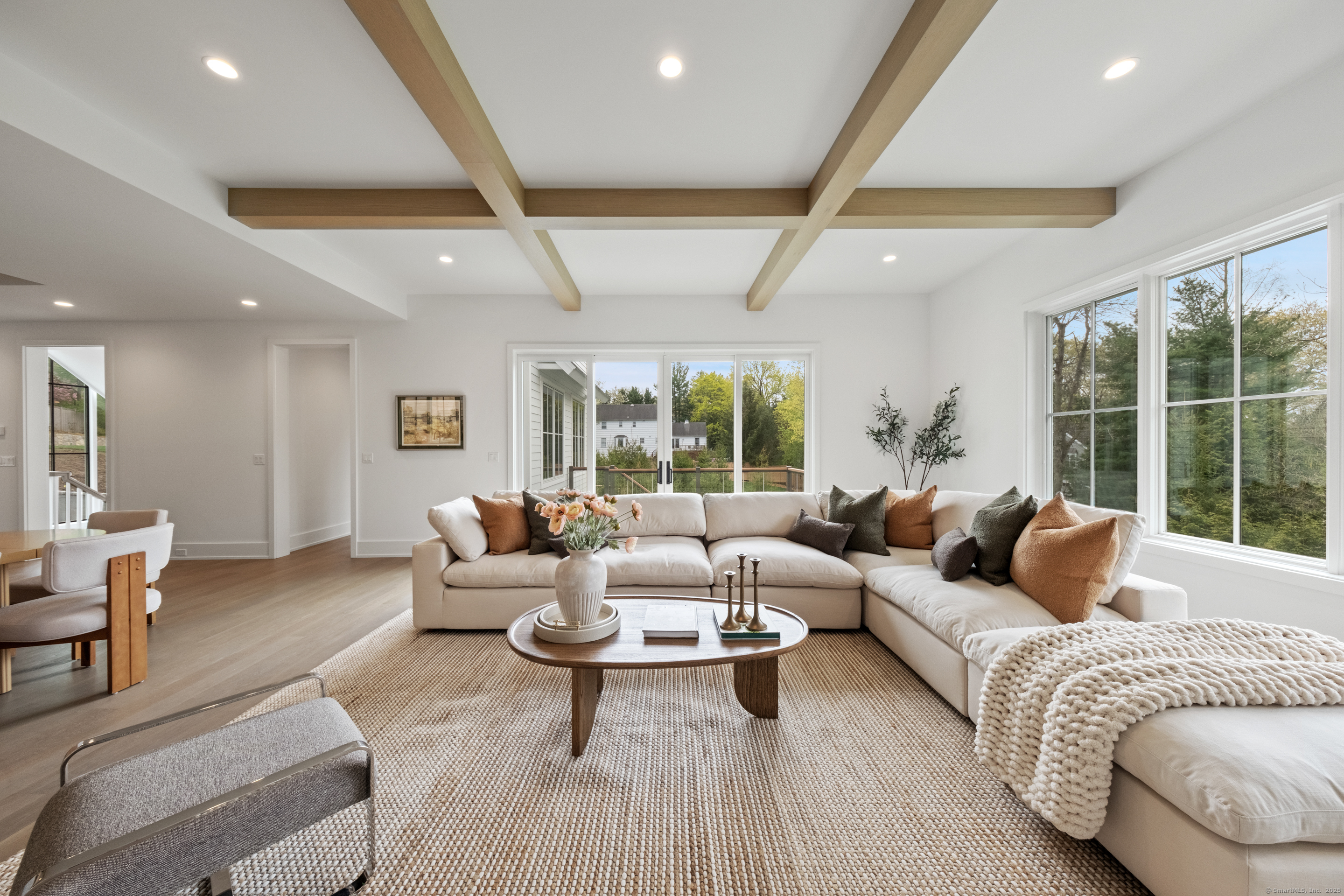 102 Compo Road South Westport, CT 06880 - Photo 12 of 40 a living room with furniture and a large window