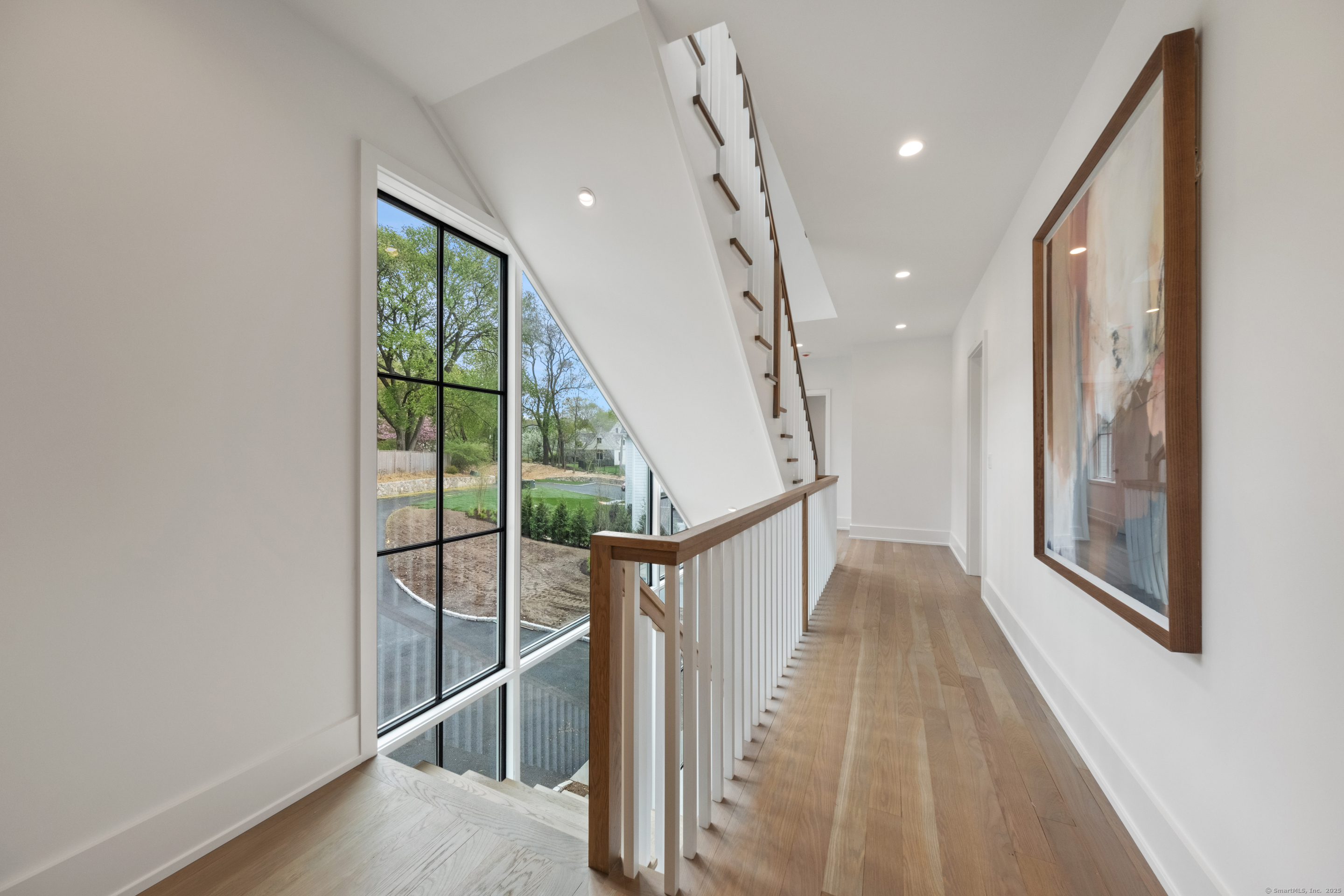 102 Compo Road South Westport, CT 06880 - Photo 18 of 40 a view of entryway and hall with wooden floor