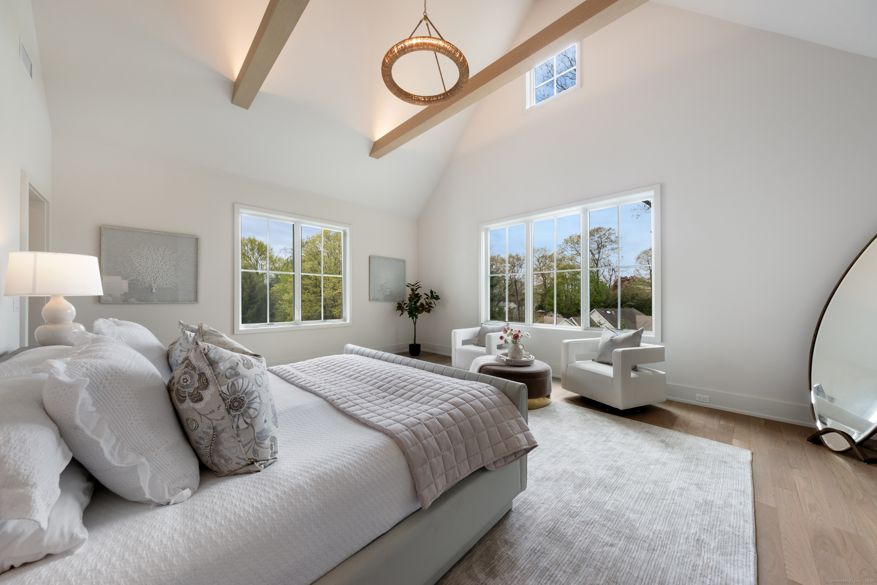 102 Compo Road South Westport, CT 06880 - Photo 20 of 40 a bedroom with bed couch and window