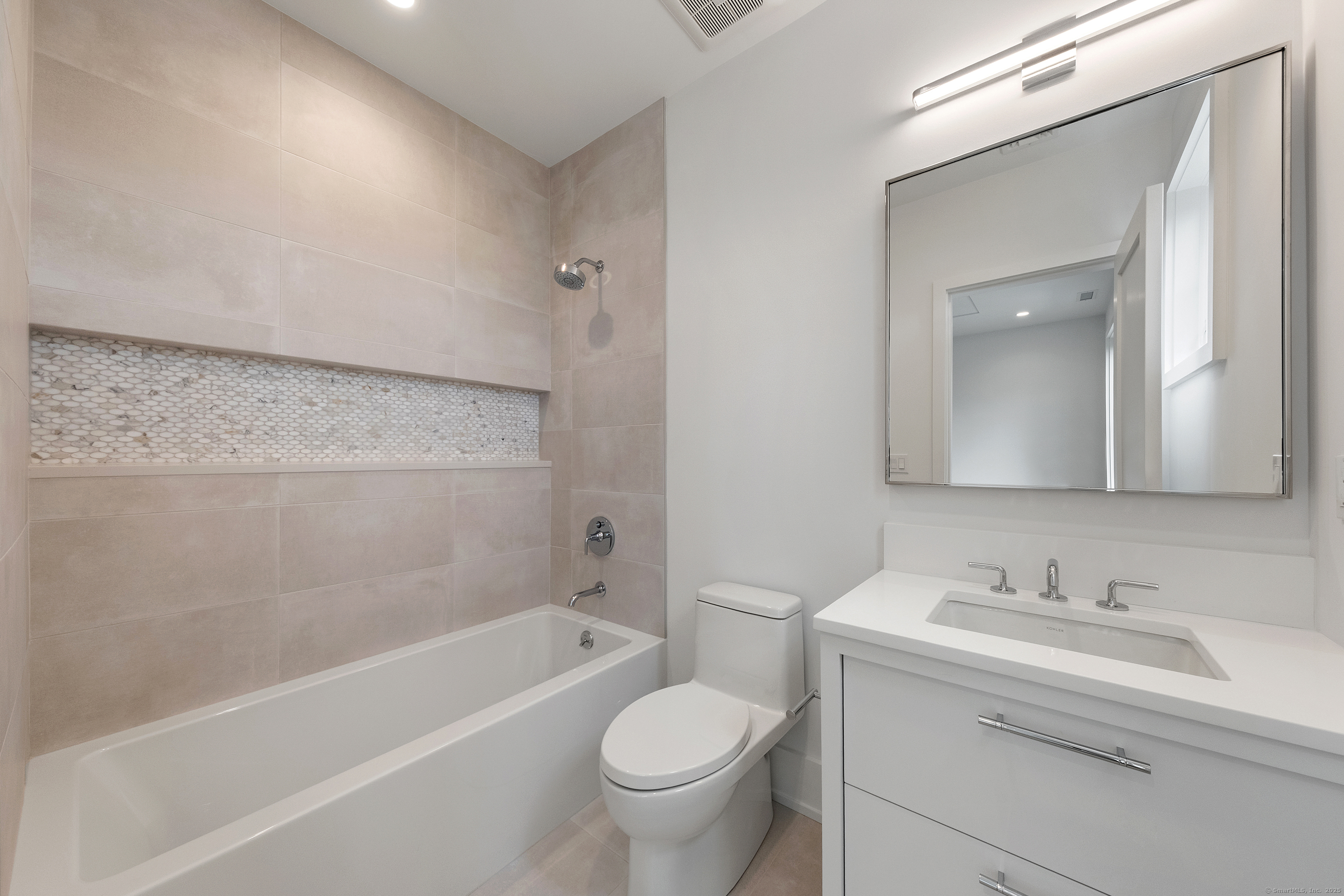 102 Compo Road South Westport, CT 06880 - Photo 31 of 40 a bathroom with a sink toilet and bathtub