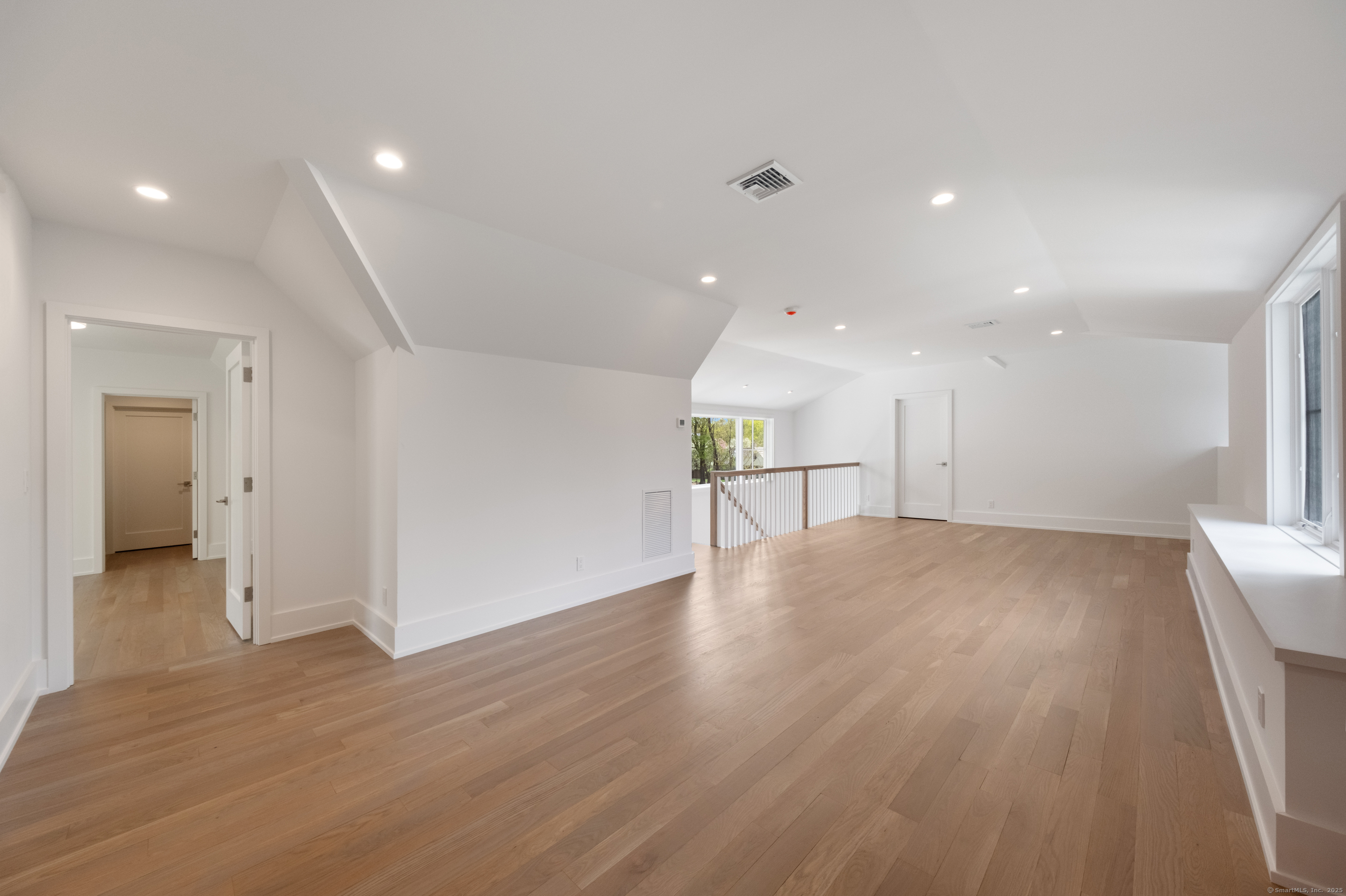 102 Compo Road South Westport, CT 06880 - Photo 33 of 40 a view of empty room with wooden floor