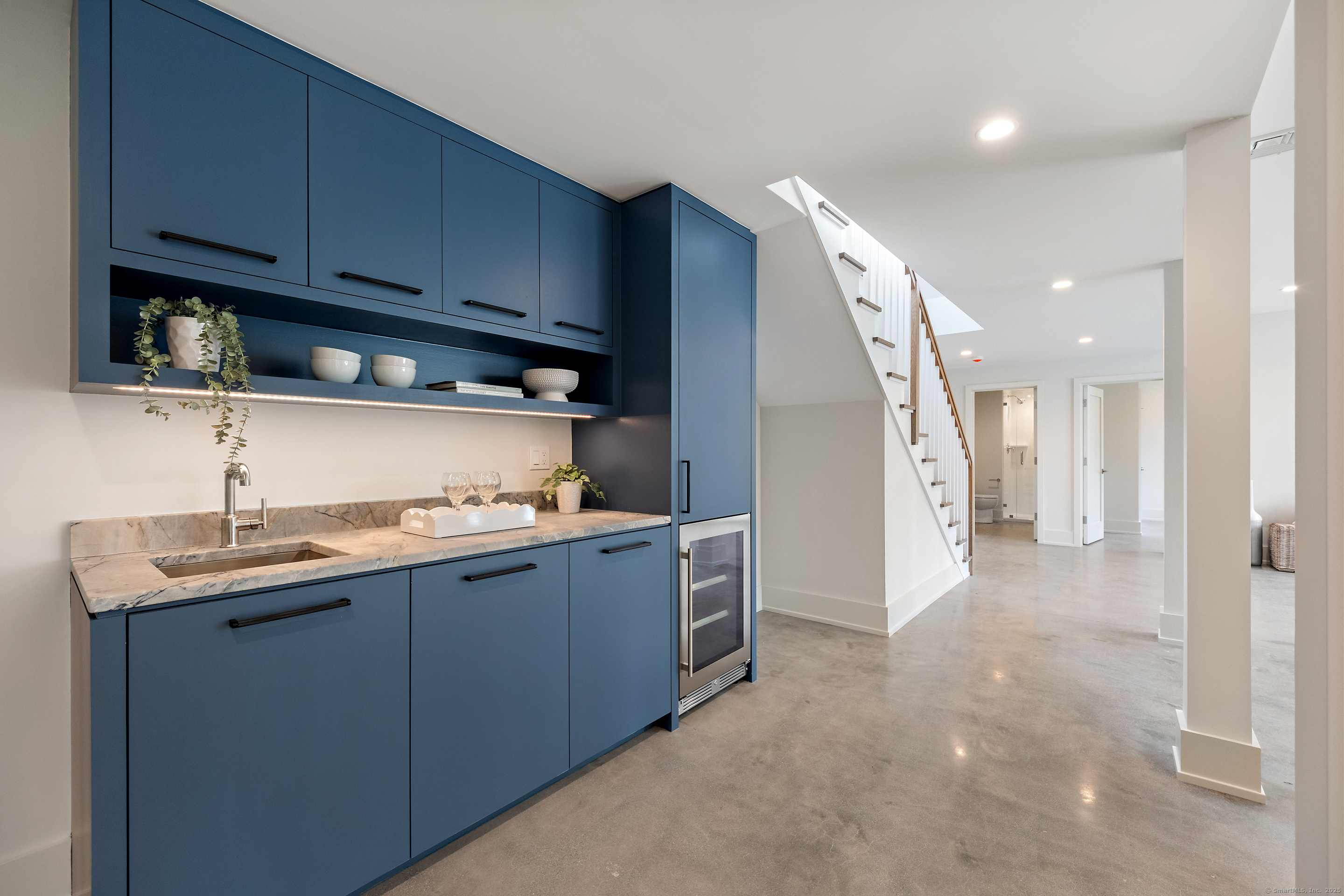 102 Compo Road South Westport, CT 06880 - Photo 35 of 40 a kitchen with stainless steel appliances granite countertop a sink stove and refrigerator