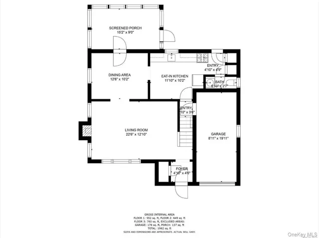 a street sign that is on a sidewalk