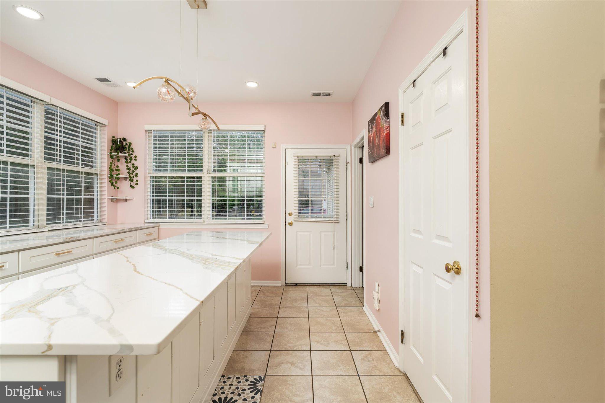 410 Denow Road Pennington, NJ 08534 - Photo 16 of 29 a bathroom with a bathtub and shower