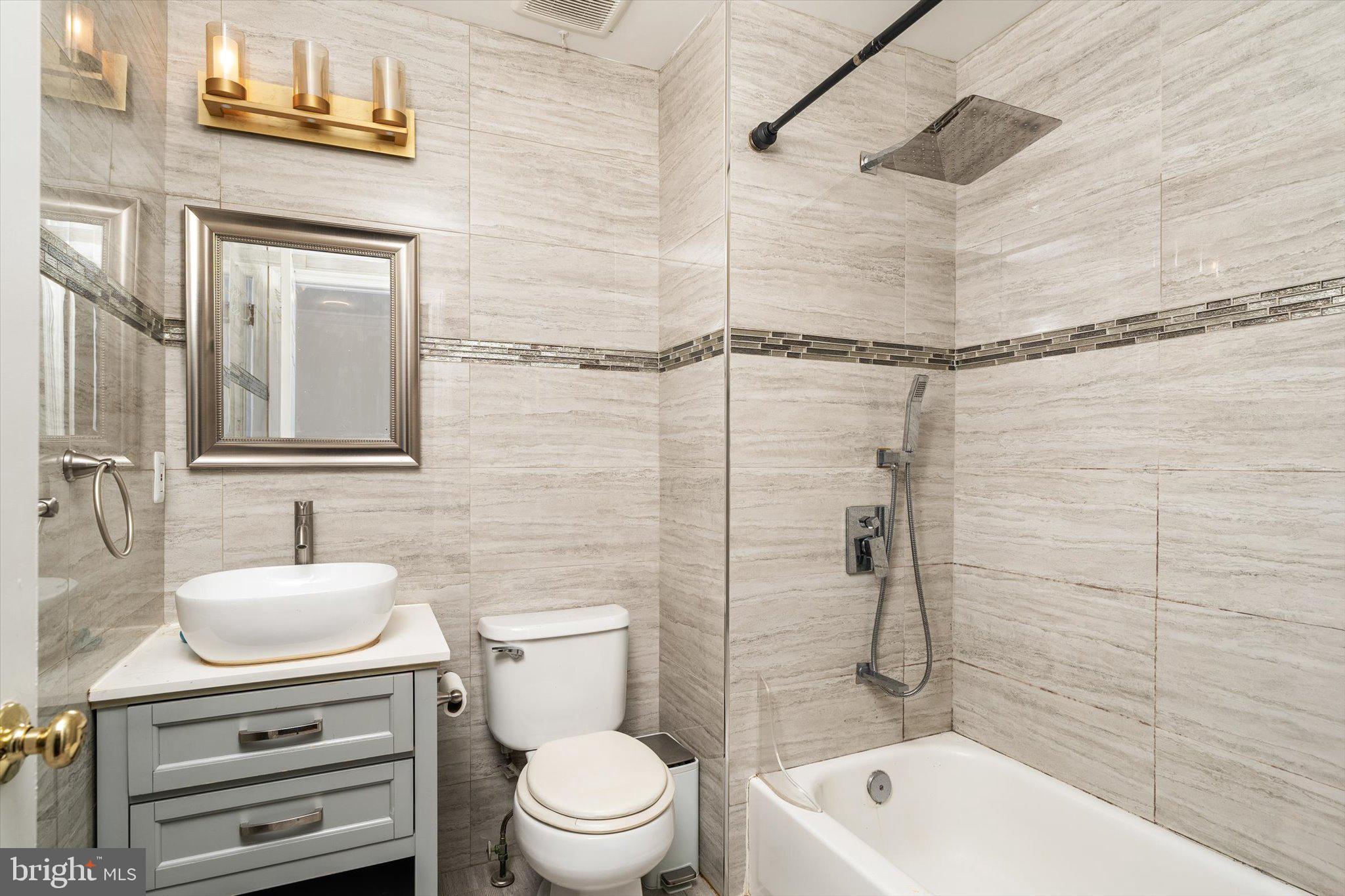 410 Denow Road Pennington, NJ 08534 - Photo 18 of 29 a bathroom with a sink a toilet and shower