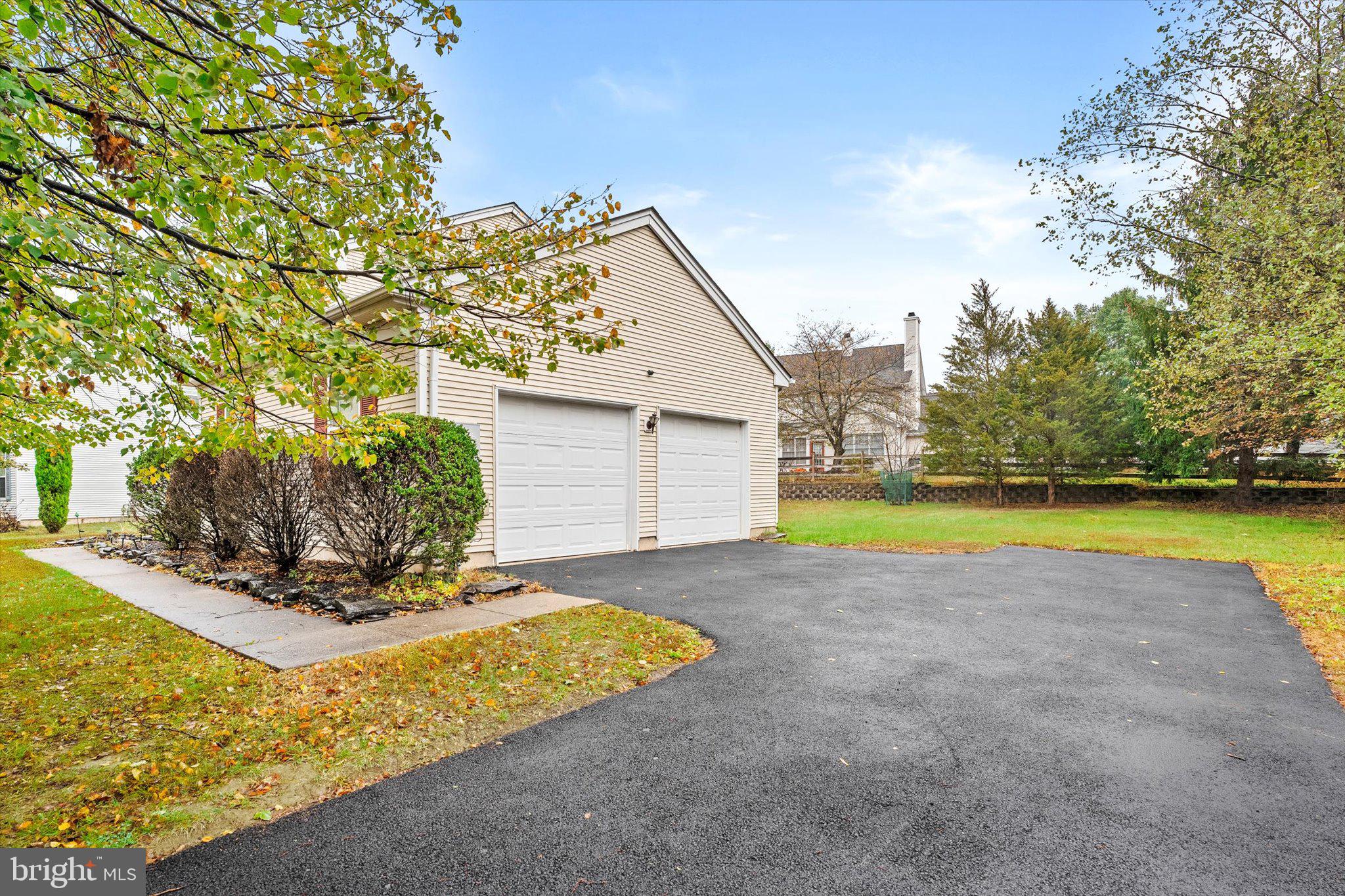 410 Denow Road Pennington, NJ 08534 - Photo 2 of 29 a view of a backyard with swimming pool