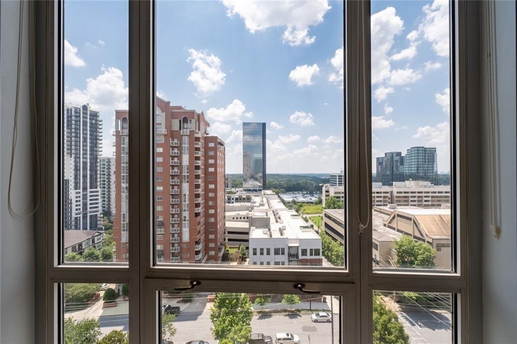 3475 Oak Valley Road Northeast, Unit 910 Atlanta, GA 30326 - Photo 27 of 27 a view of a city from a window