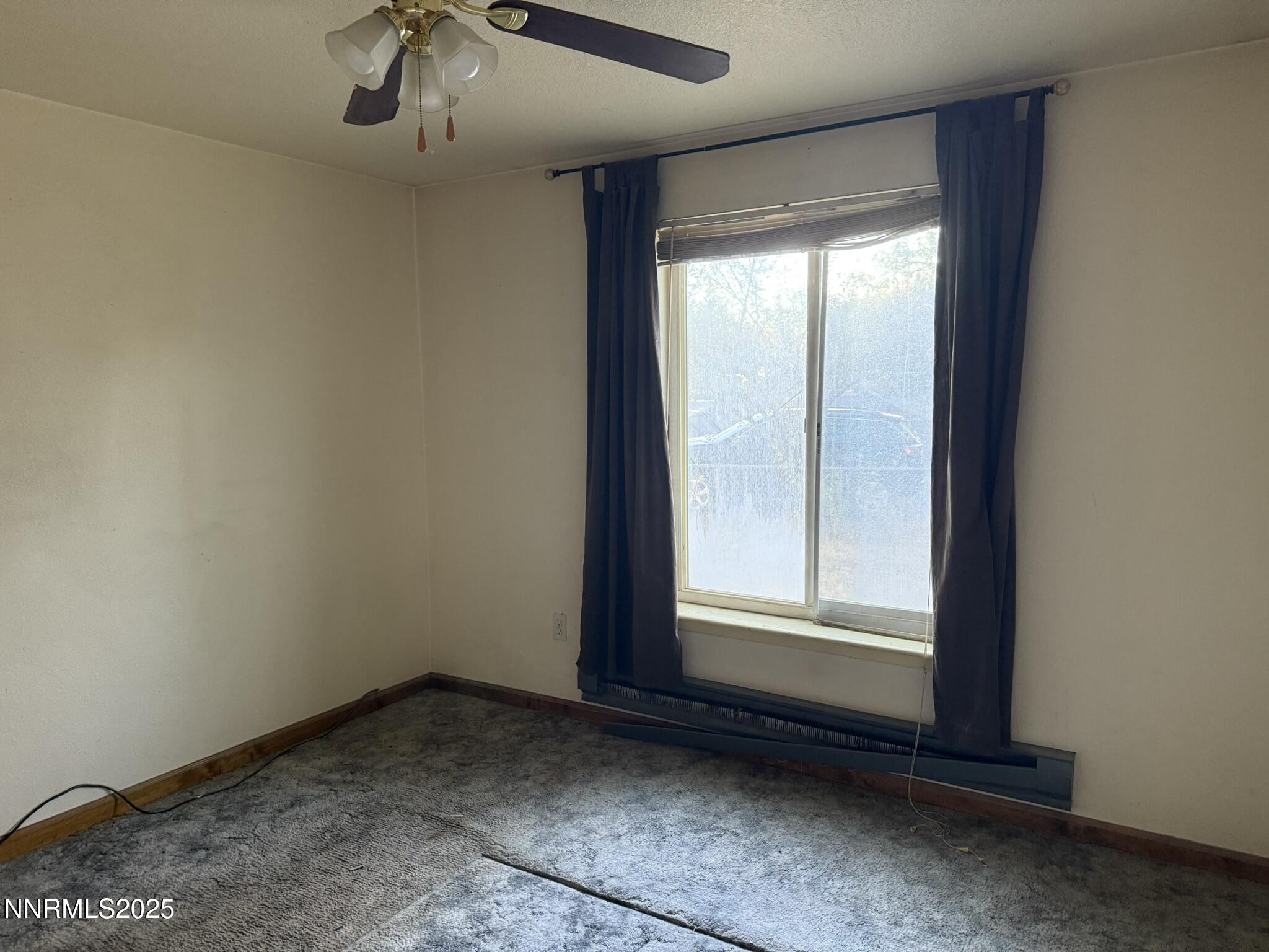 502 Prebble Street Winnemucca, NV 89445 - Photo 12 of 13 a view of empty room with window