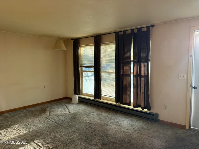 an empty room with sliding door