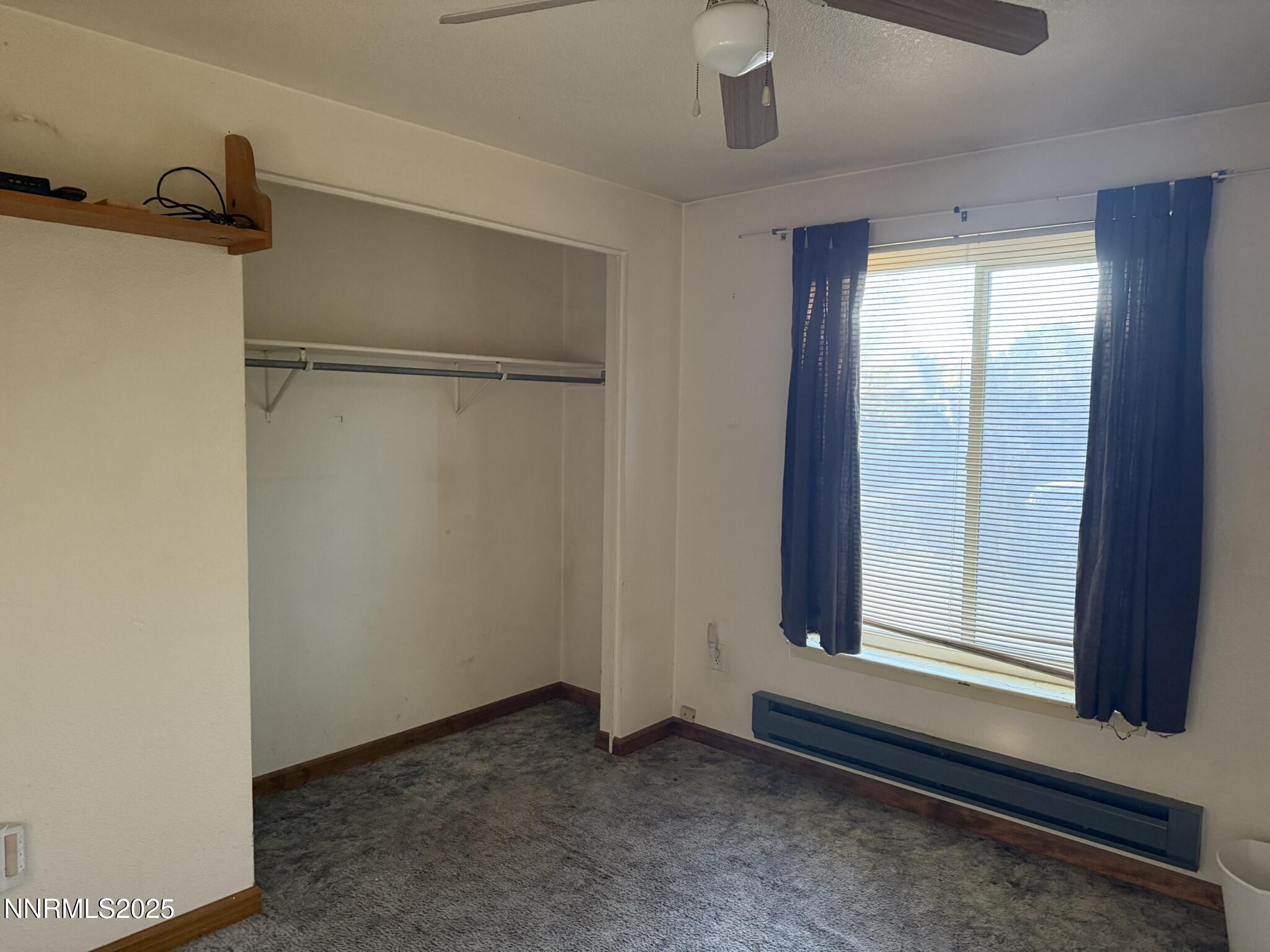 502 Prebble Street Winnemucca, NV 89445 - Photo 9 of 13 a view of an empty room with a window