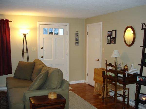499 Worcester Road Barre, MA 01005 - Photo 8 of 13 a living room with furniture and a mirror