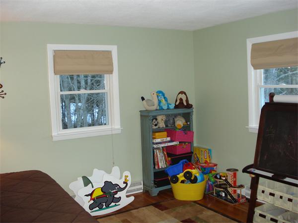 499 Worcester Road Barre, MA 01005 - Photo 10 of 13 a room with toys and wooden floor