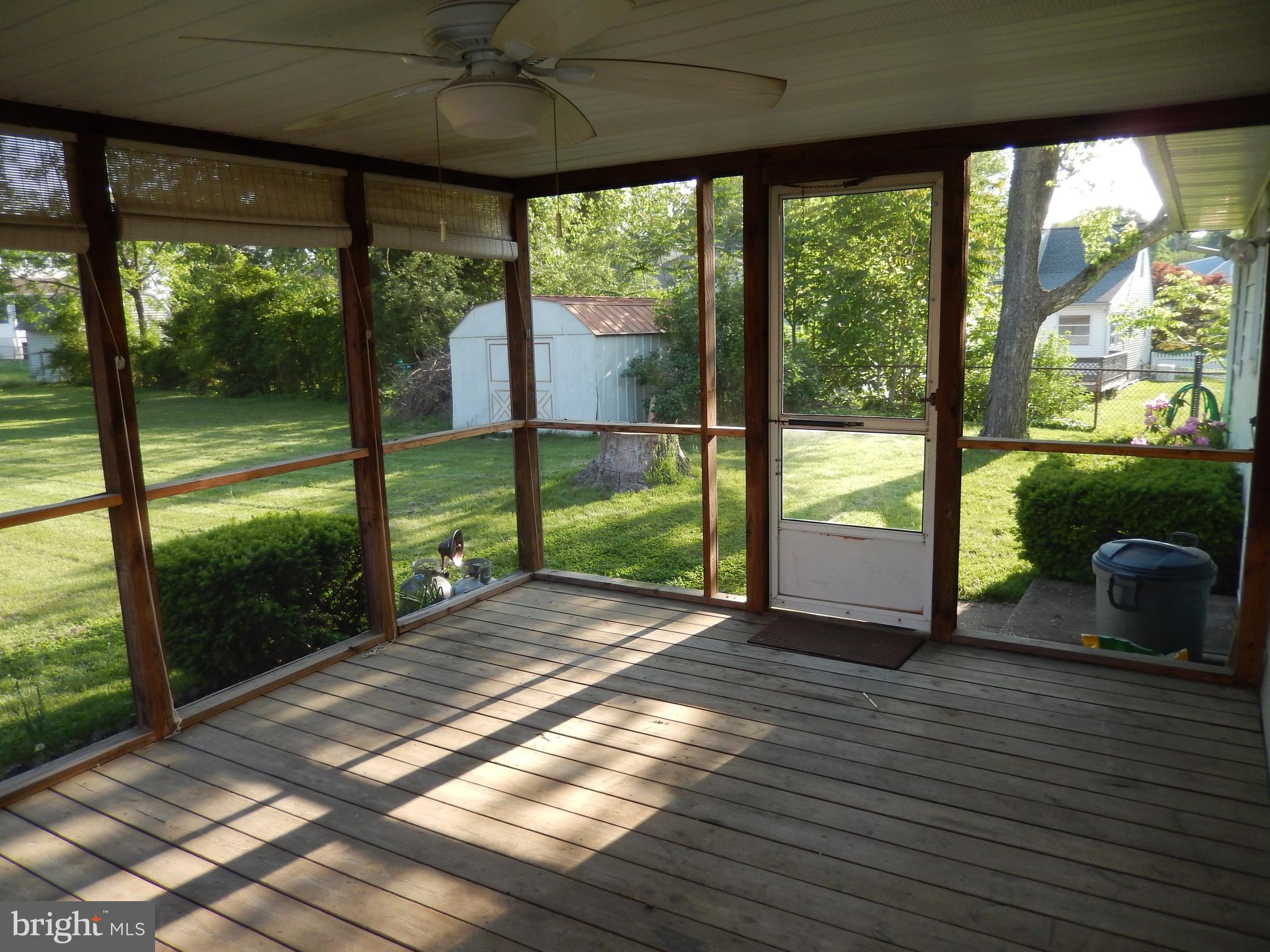 537 Hawthorne Road Linthicum Heights, MD 21090 - Photo 4 of 16 Screened in sun porch