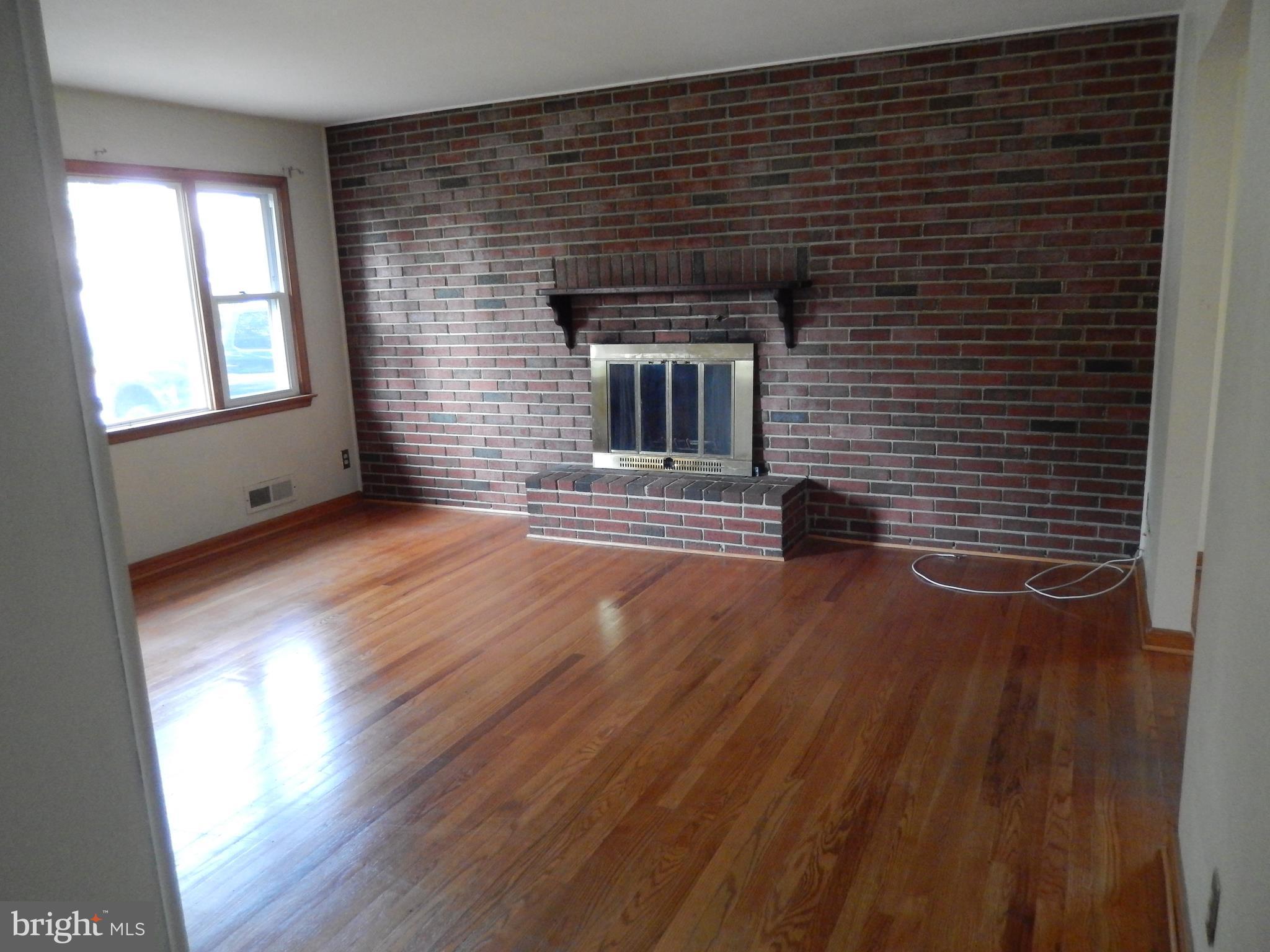 537 Hawthorne Road Linthicum Heights, MD 21090 - Photo 10 of 16 Living Room with beautiful hardwood floors