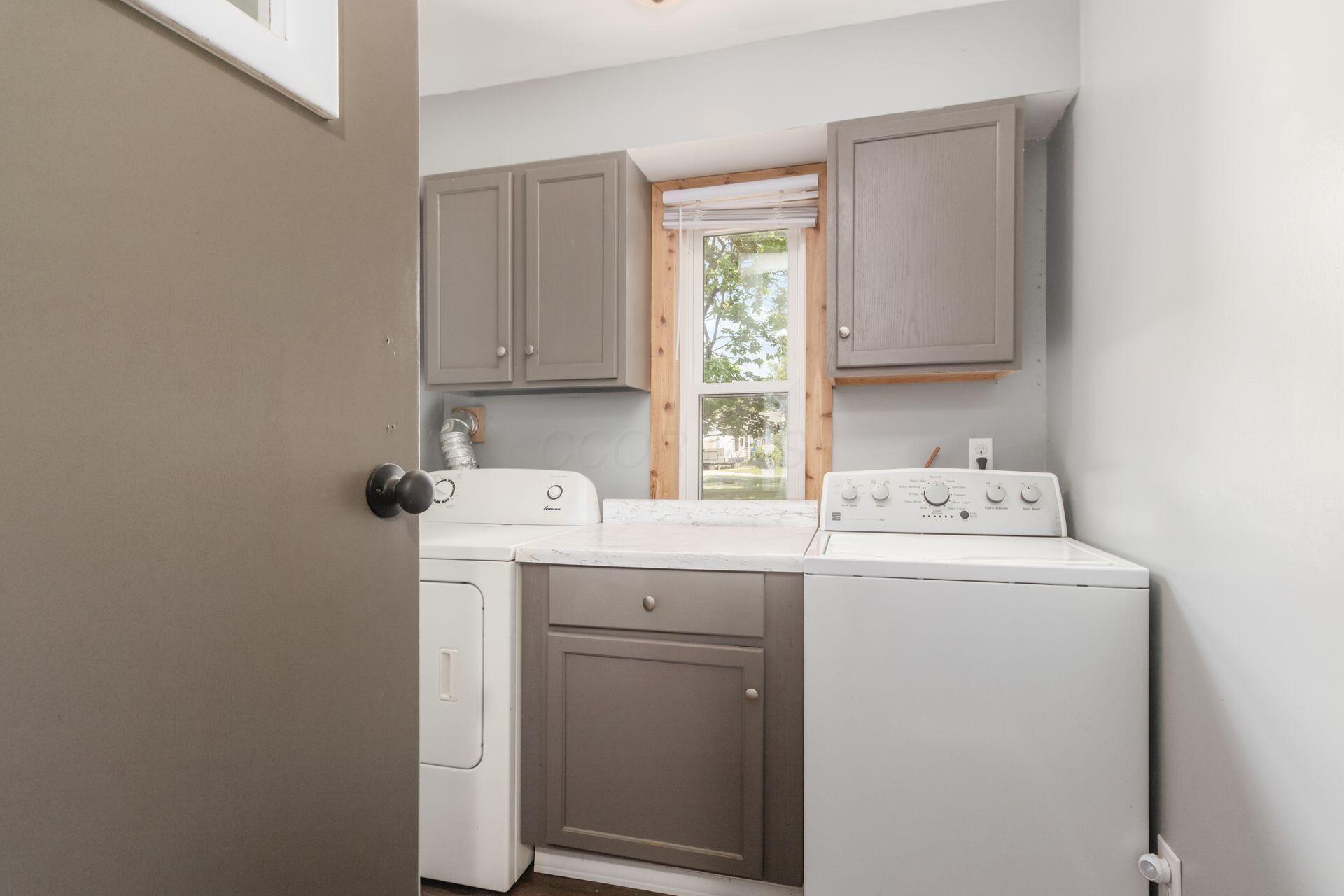 14066 Cleveland Road Southwest Pataskala, OH 43062 - Photo 23 of 37 Main Level Laundry