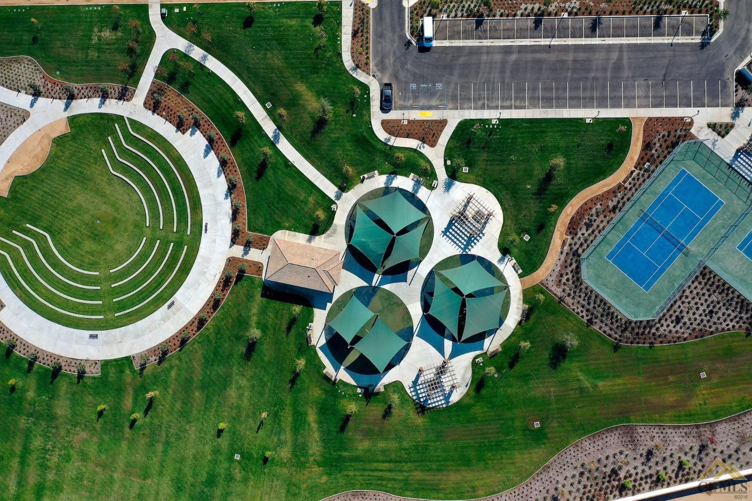 Undisclosed Address Bakersfield, CA 93311 - Photo 27 of 30 an aerial view of a house with outdoor space and pool