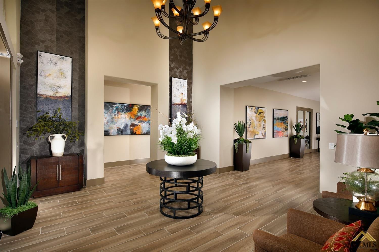 Undisclosed Address Bakersfield, CA 93311 - Photo 10 of 30 a living room with furniture and a potted plant