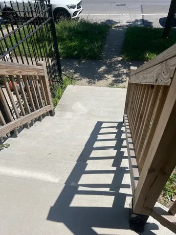 a view of stairs and yard